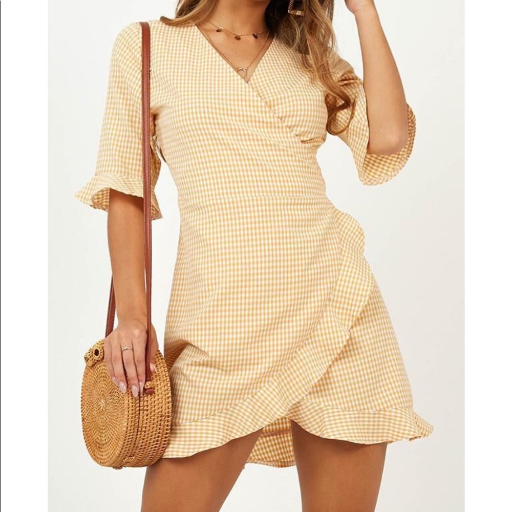 Plus size yellow gingham wrap dress
